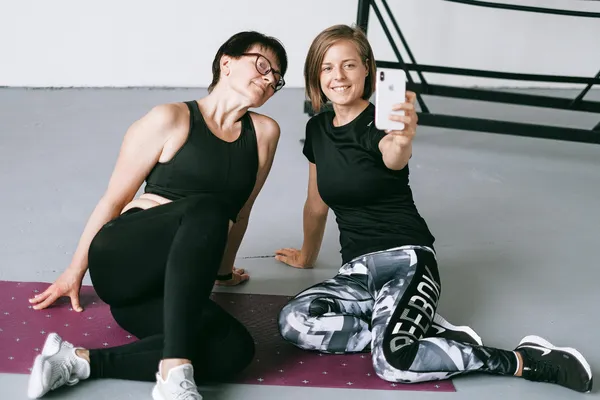 Personal trainer building online fitness business with digital coaching platform and client management