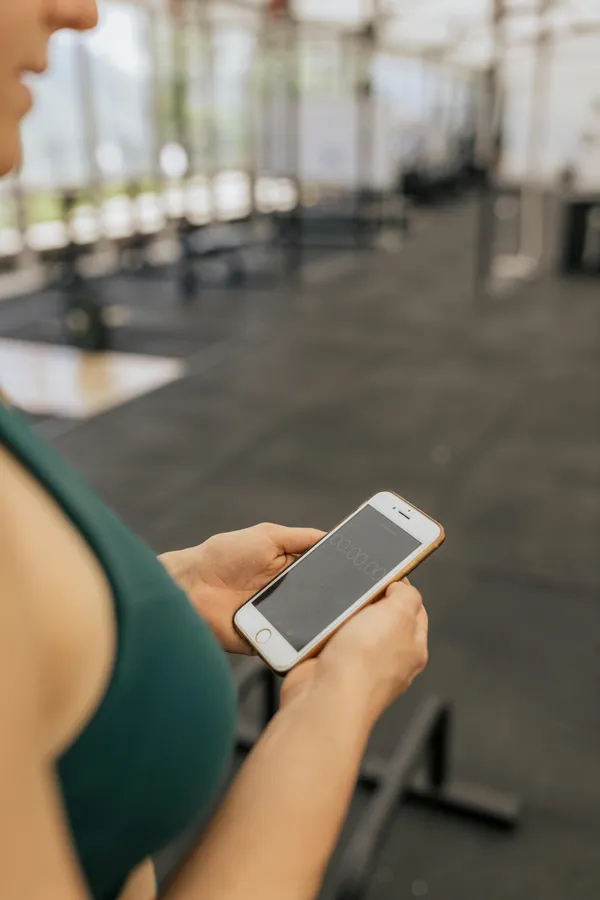 Digital client progress tracking dashboard showing fitness analytics and progress